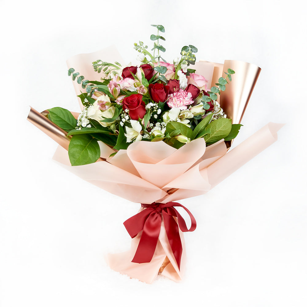 Elegant Multi-Flower Bouquet with Spray Roses – how the gift is presented